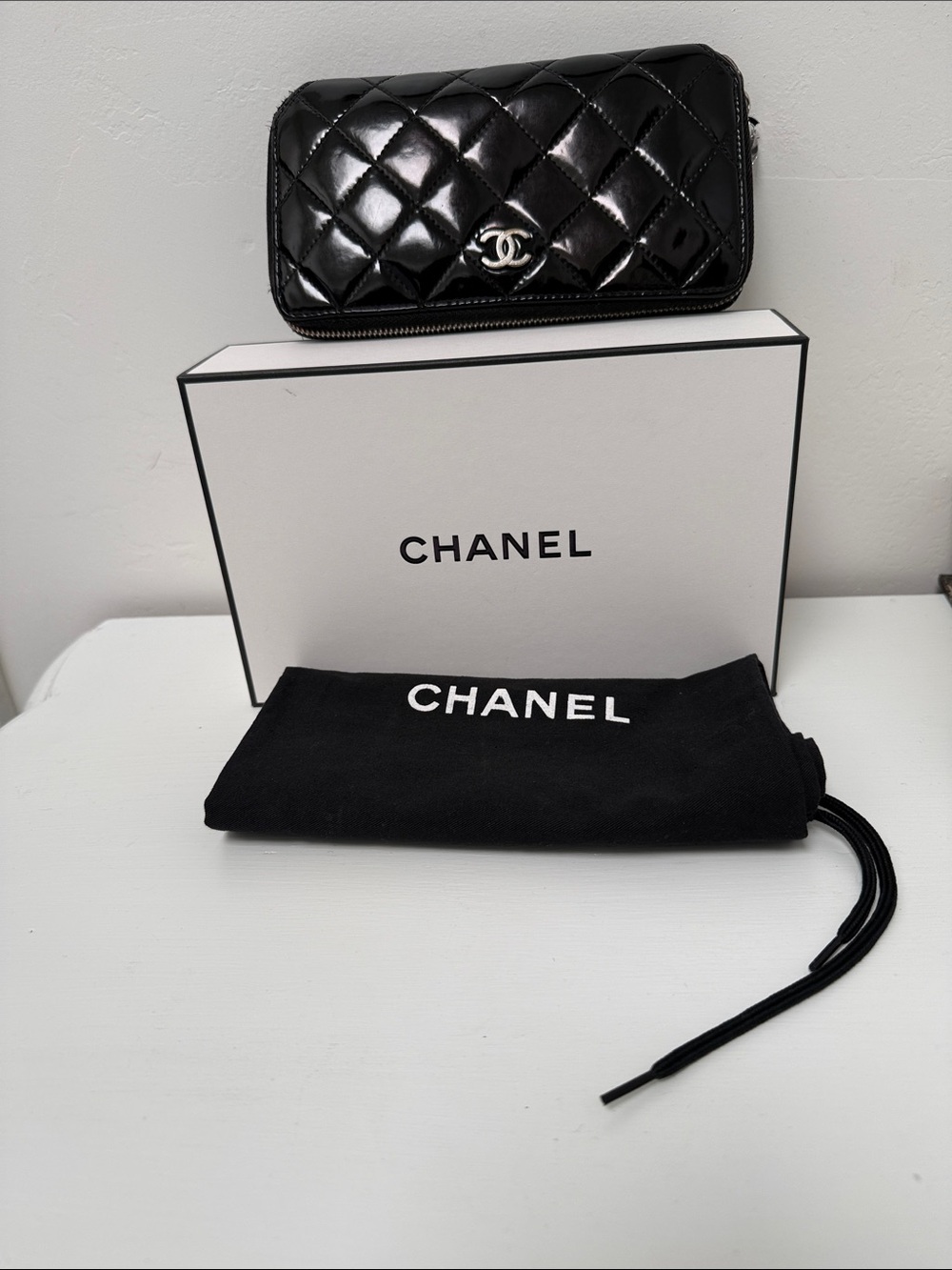 CHANEL Black Quilted Patent Leather Zip-Around Wallet with CC Logo